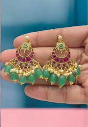 Stunning earrings with green stone and guttapusalu hangings